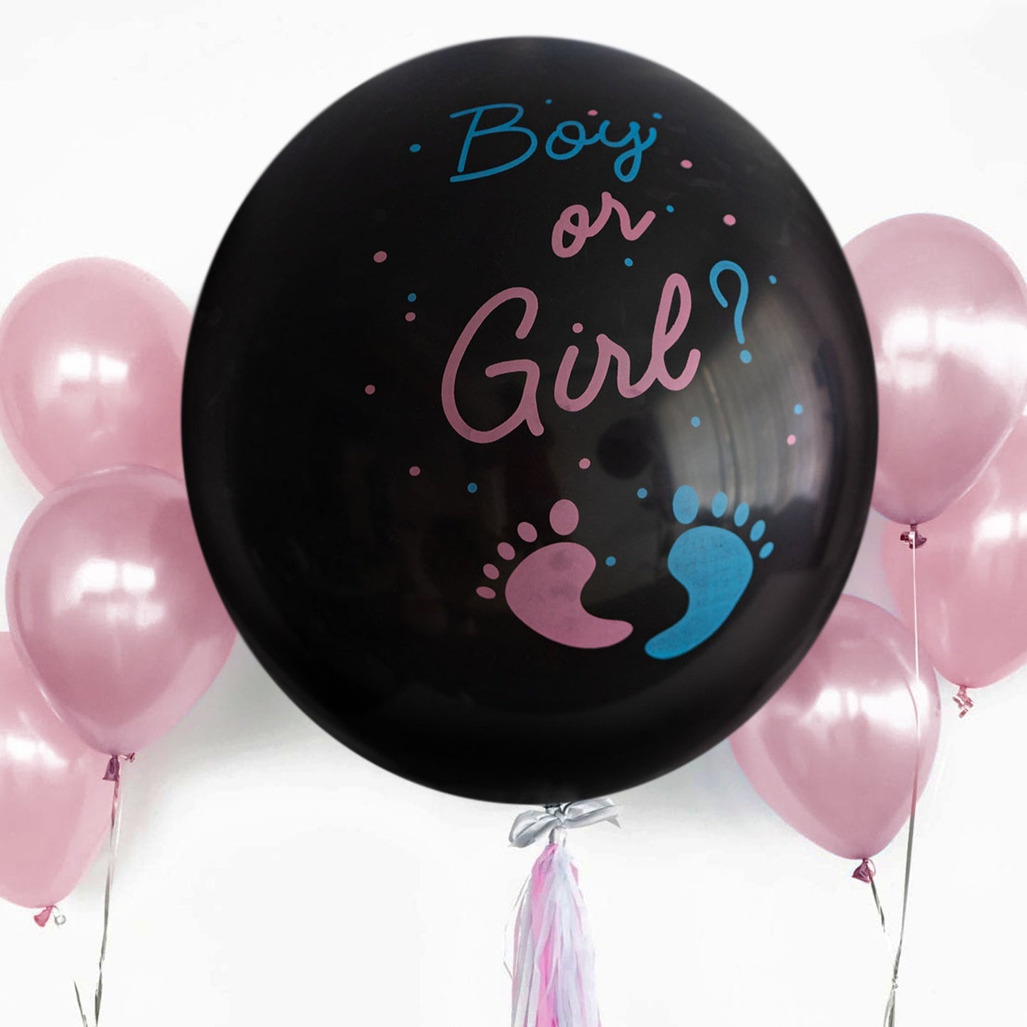 Black balloon with pink and blue confetti, surrounded by pink balloons.