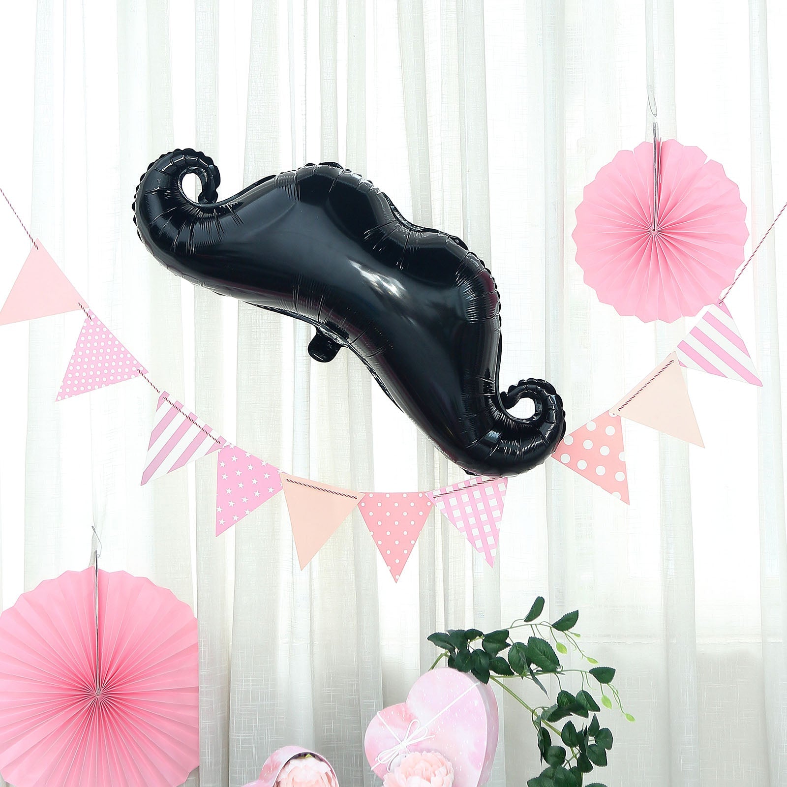 31" black mustache shaped mylar balloon for party decorations.