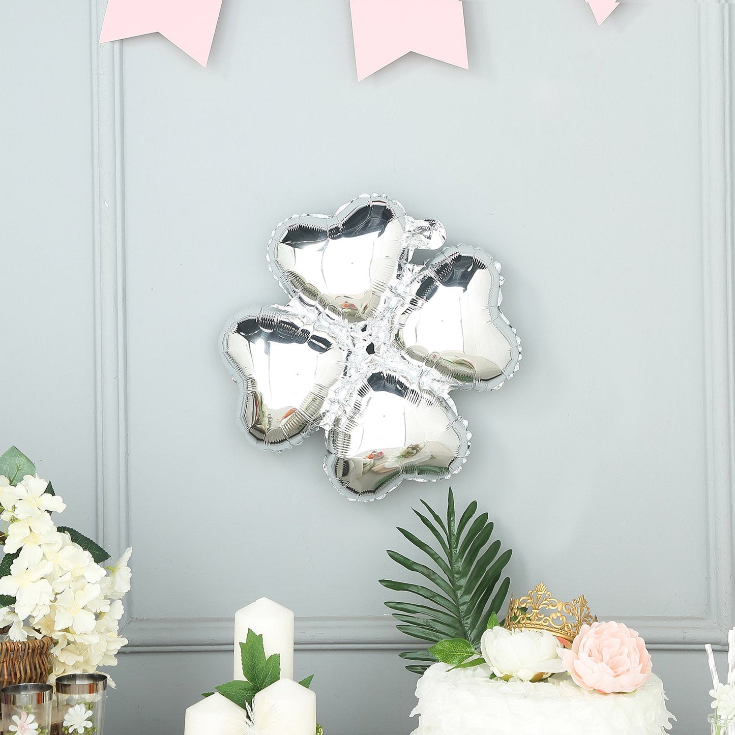 Shiny silver four leaf clover shaped mylar foil balloons, 15 inches, pack of 10.
