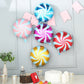 Colorful candy striped swirl print mylar foil balloons.