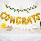 Shiny gold "Congrats" Mylar foil balloon banner sign.