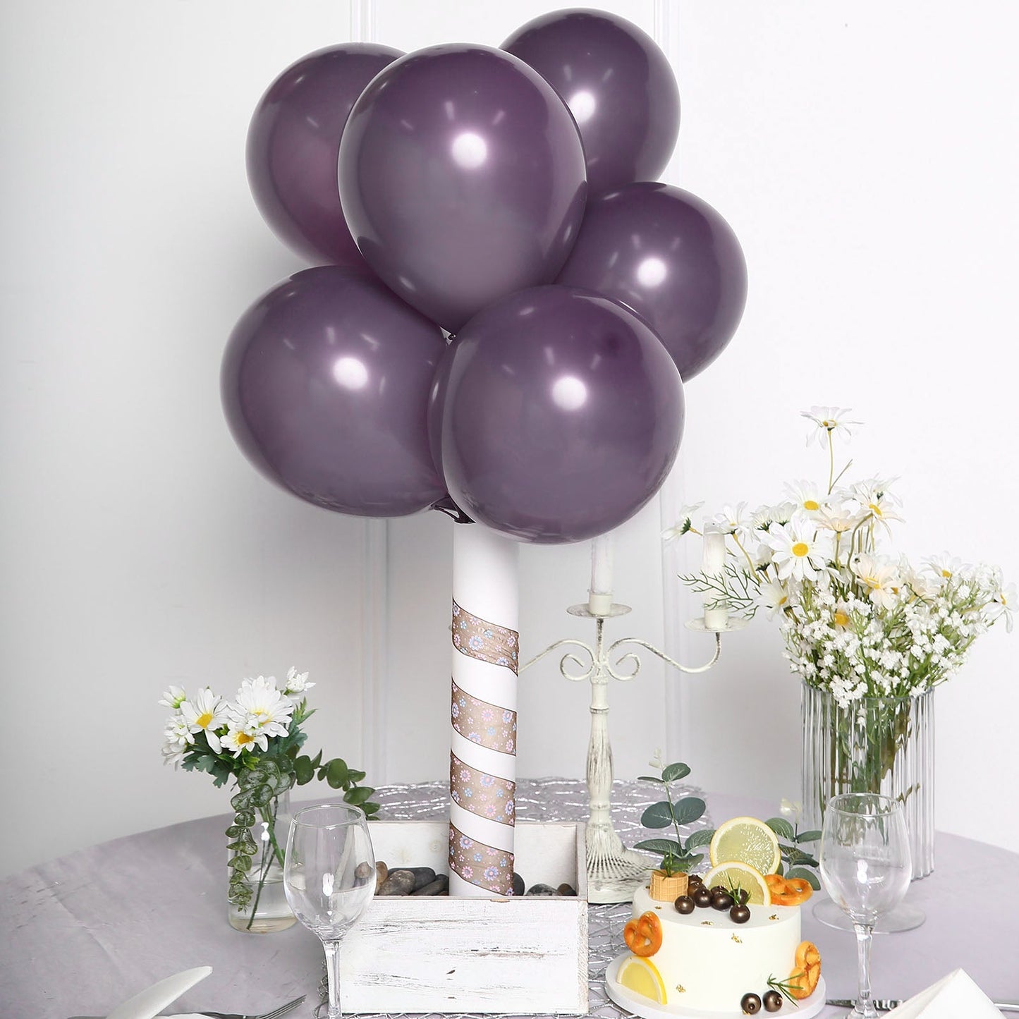 Matte pastel violet amethyst balloons arranged in a decorative display.