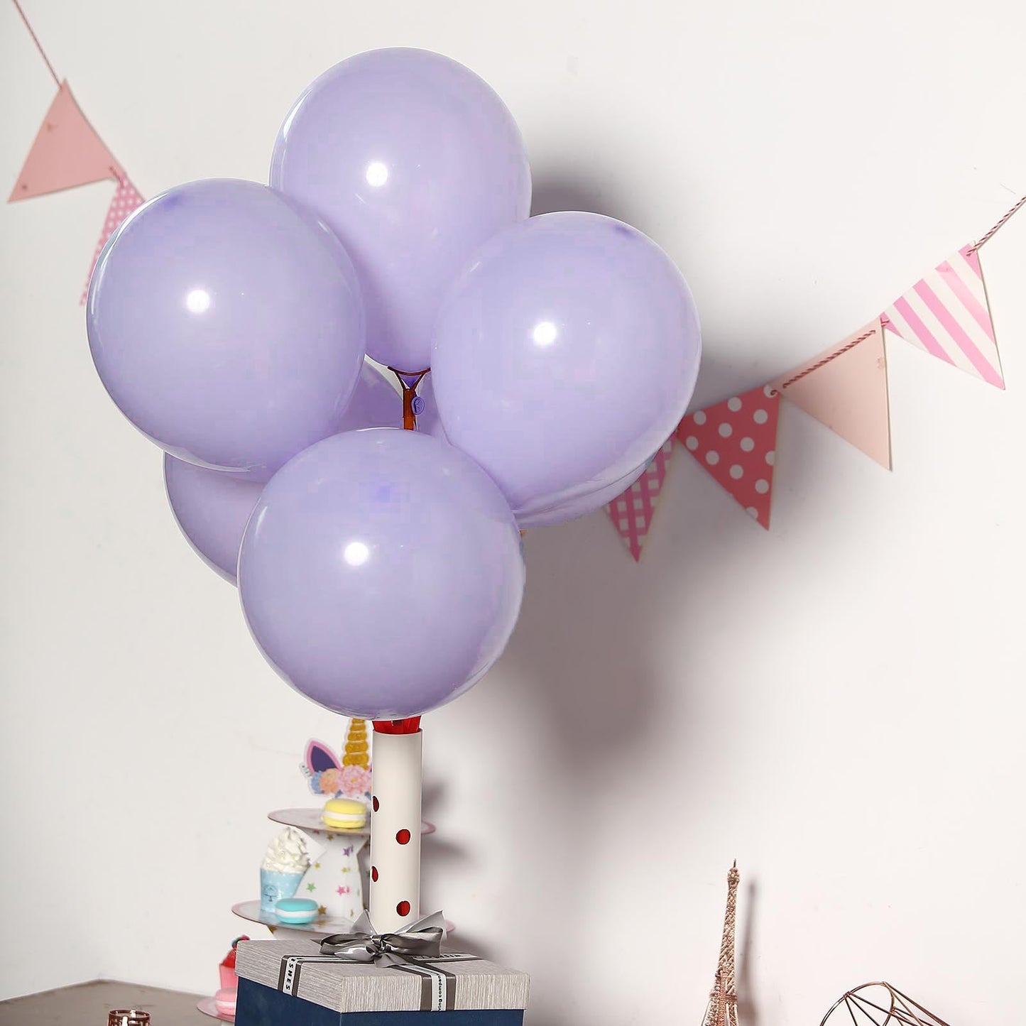 10" Matte Pastel Periwinkle Balloons with decorative bunting.