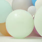 Matte pastel mint balloons in a vibrant arrangement.