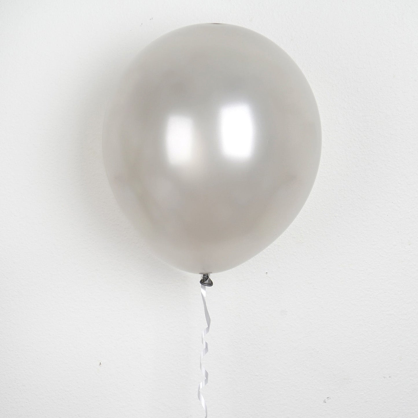 12" Shiny Pearl Silver Latex Balloon - Perfect for celebrations and events.
