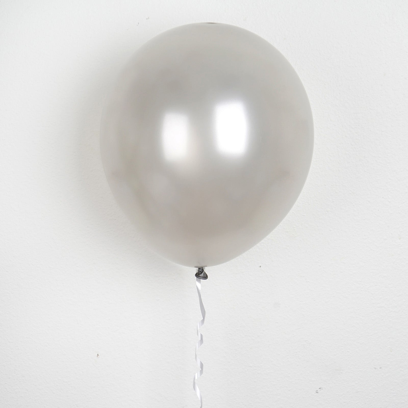 12" Shiny Pearl Silver Latex Balloon - Perfect for celebrations and events.