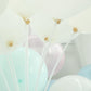 Clear balloon centerpiece holder kit with white balloons.