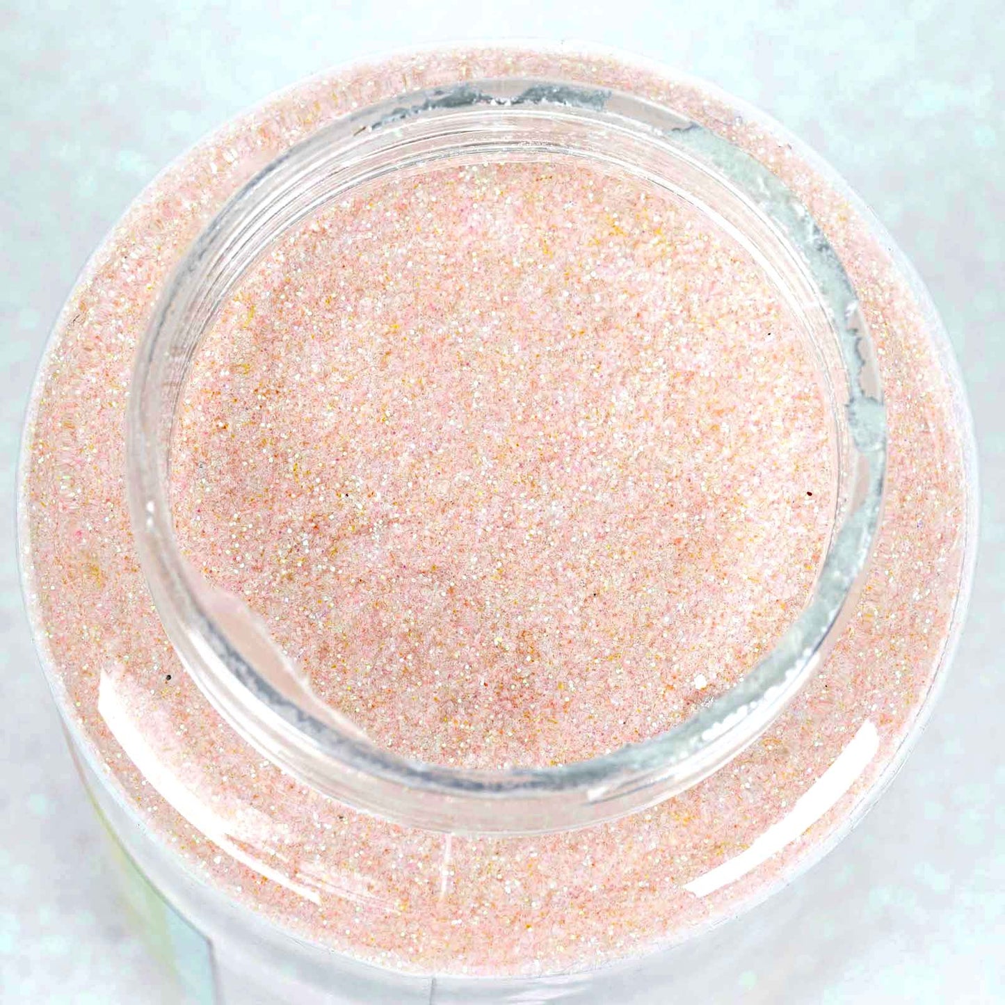 Extra fine nontoxic blush pink glitter in a 1 lb bottle.