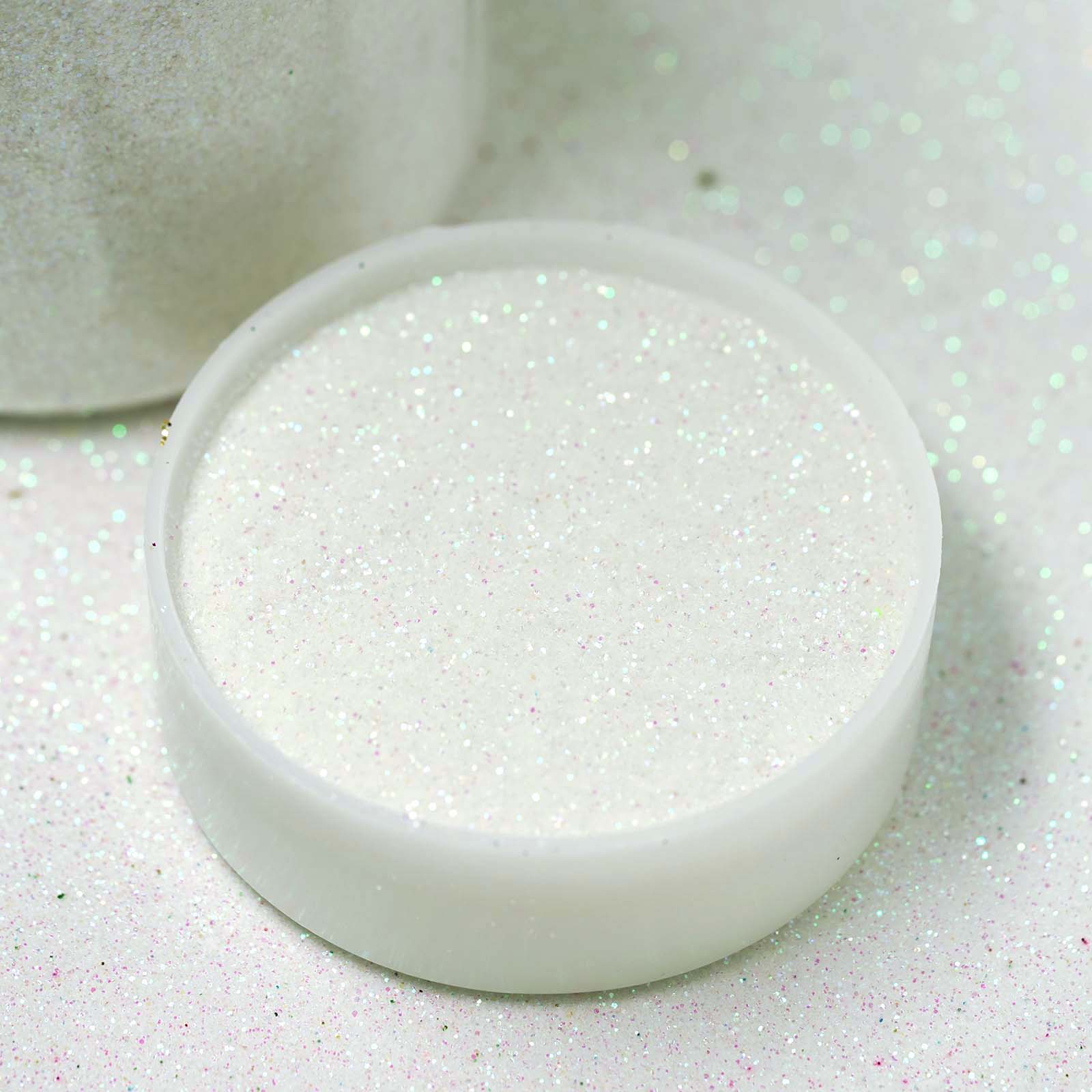 Nontoxic white extra fine glitter in a round container.