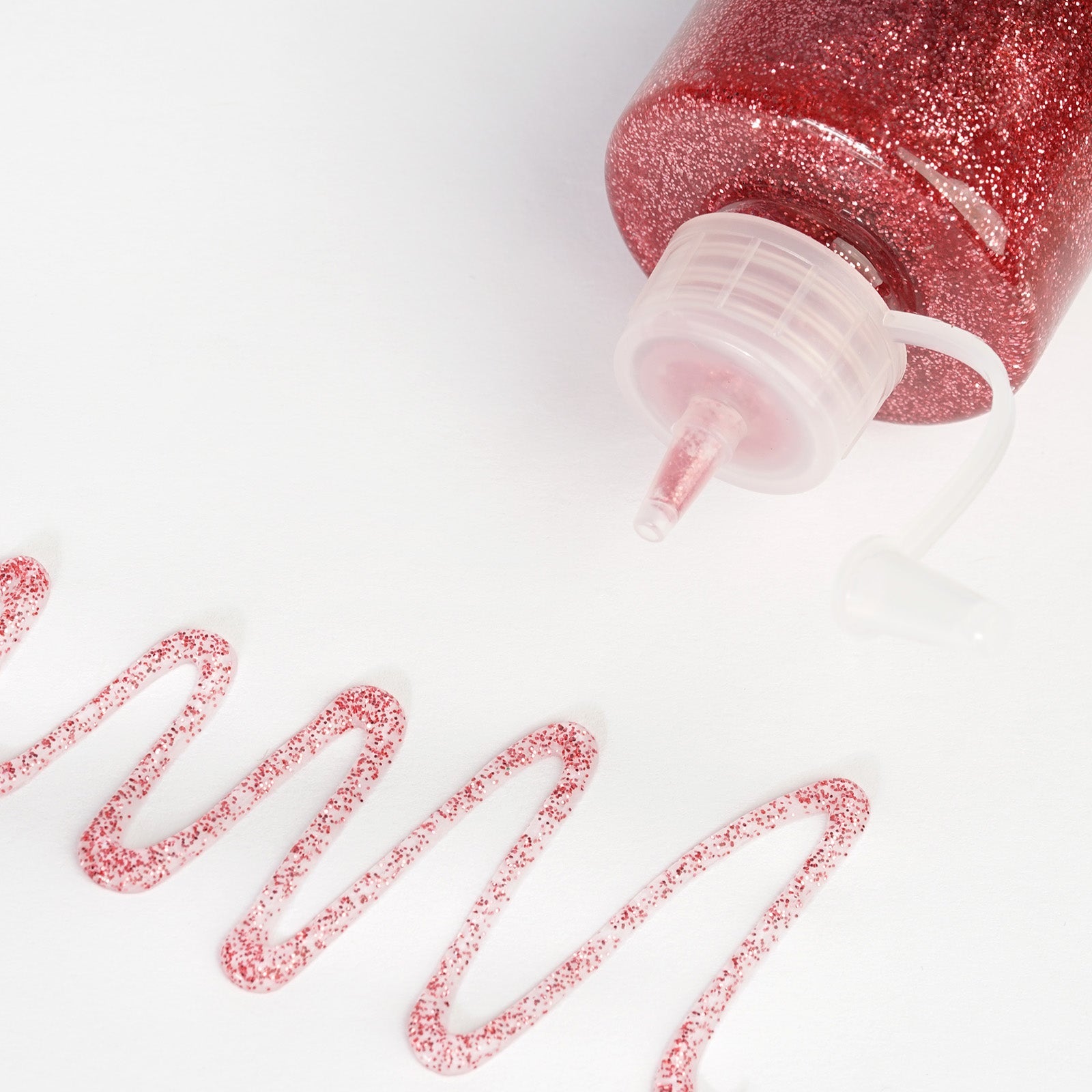 Metallic rose gold glitter glue for DIY crafts and sensory bottles.