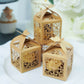 Gold butterfly top laser cut lace favor candy gift boxes.