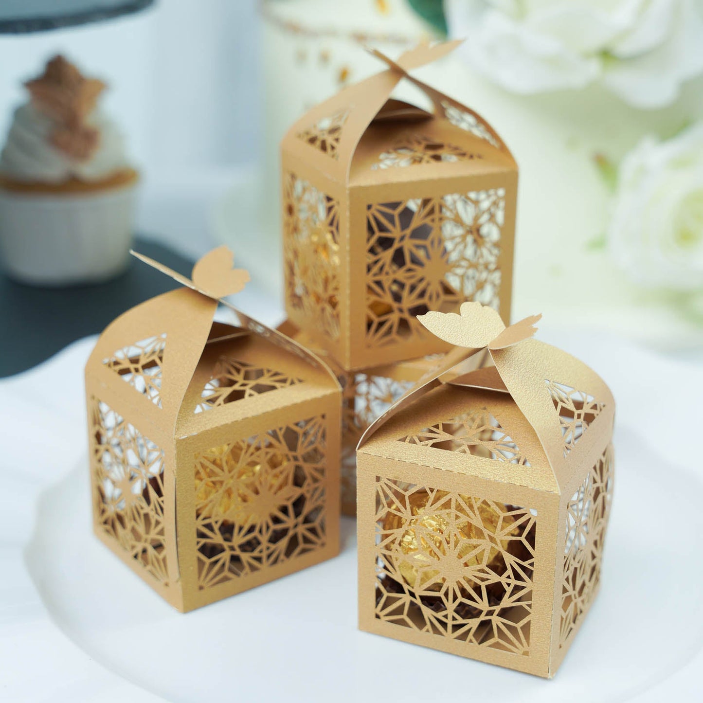 Gold butterfly top laser cut lace favor candy gift boxes.