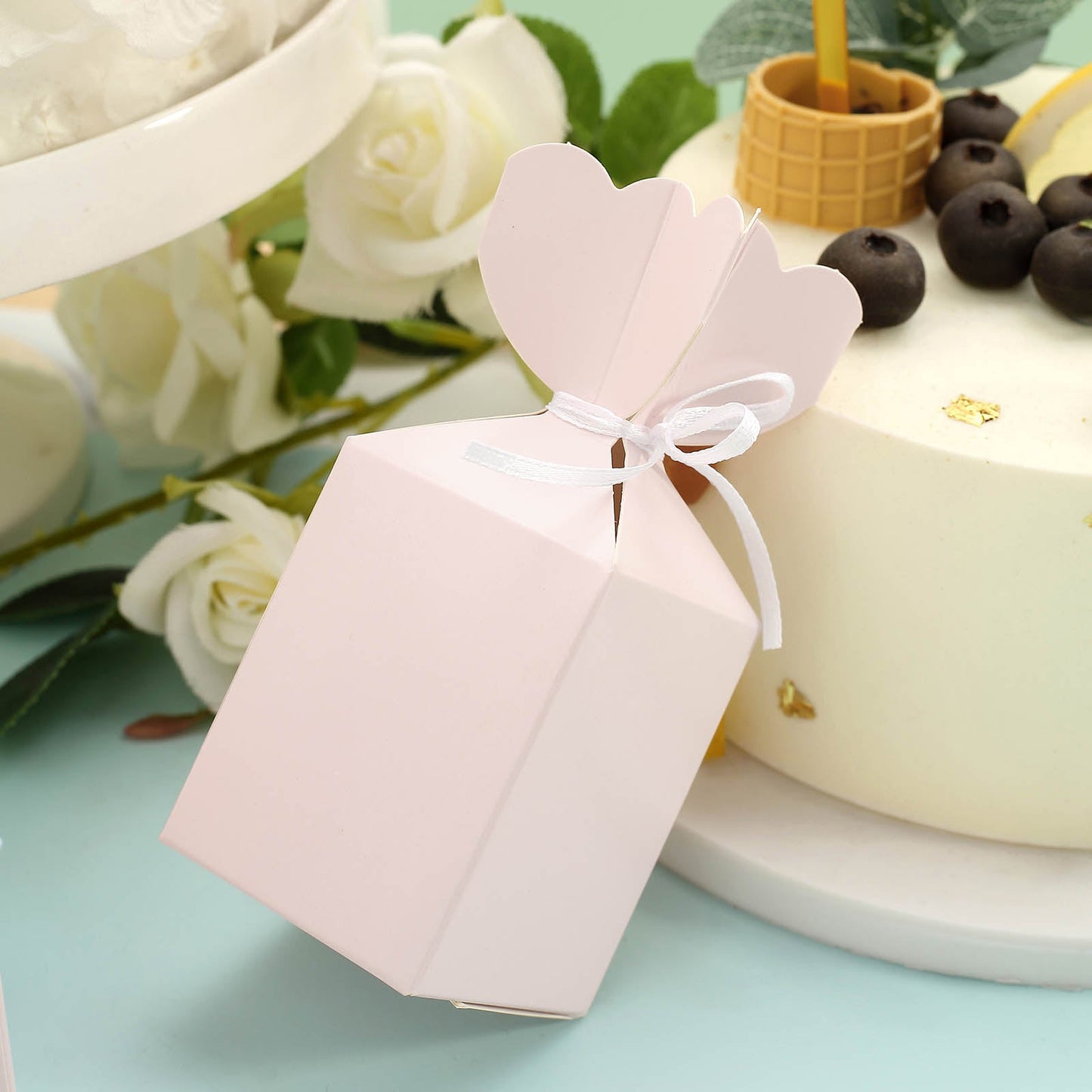 Blush floral top satin ribbon gift box for party favors.
