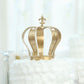 Gold crown cake topper with Fleur-De-Lis design, elegant centerpiece for celebrations.