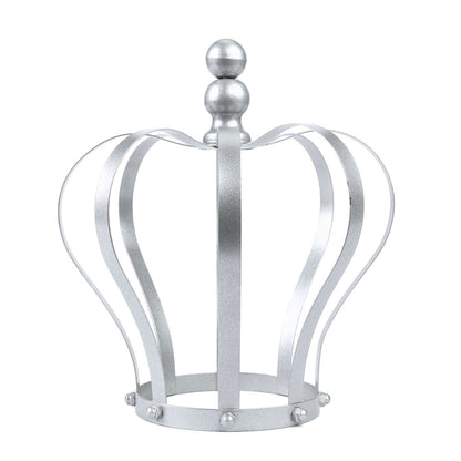 Matte silver metal crown cake topper for wedding decor.