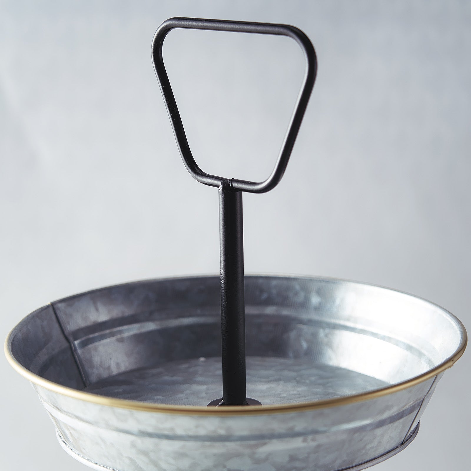 Rustic galvanized metal 3-tier serving tray for desserts and cupcakes.