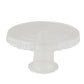 Clear round pedestal cupcake stand with interchangeable ribbon trim edge.