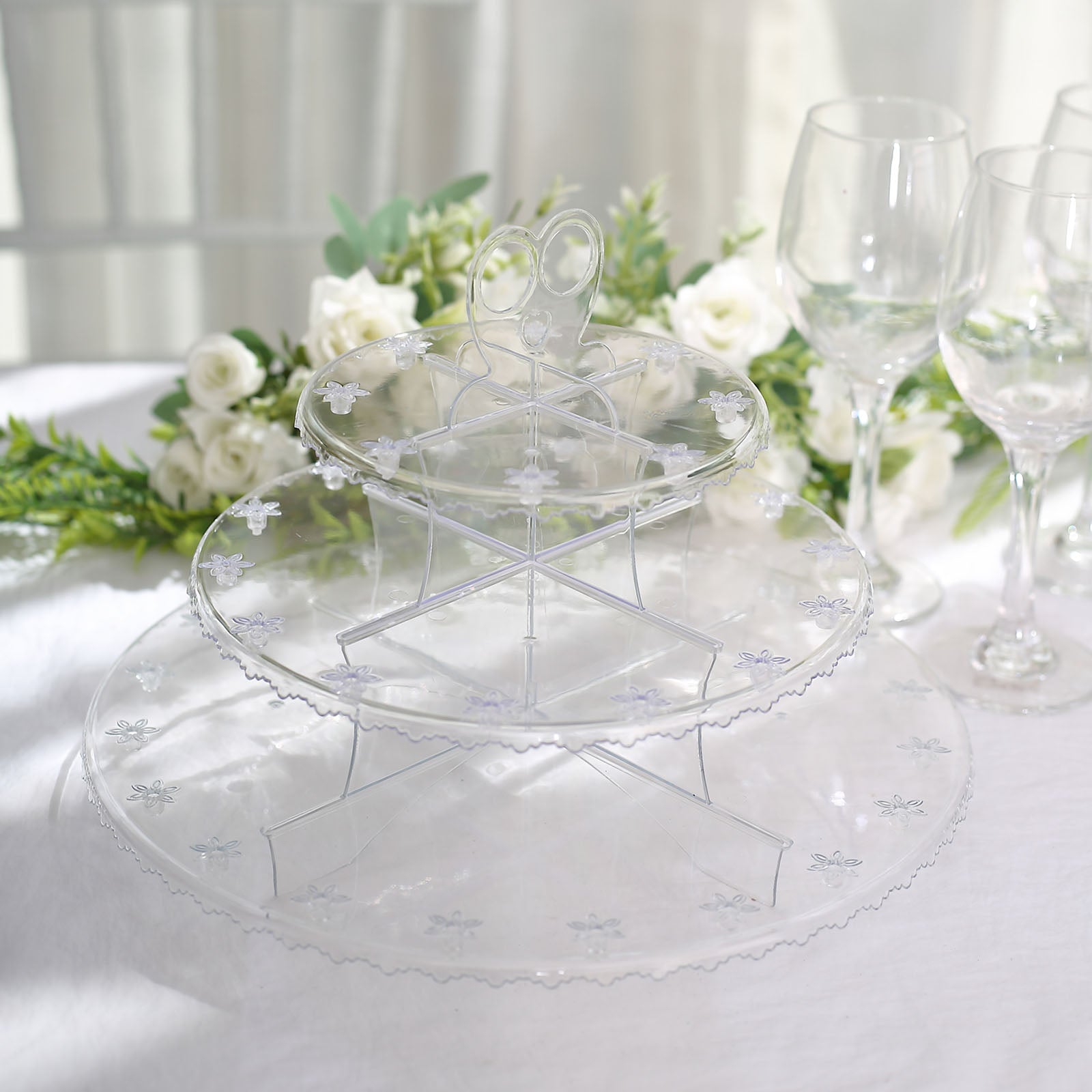 Clear 3-tier round plastic cake pop holder dessert tower with floral cut rims.