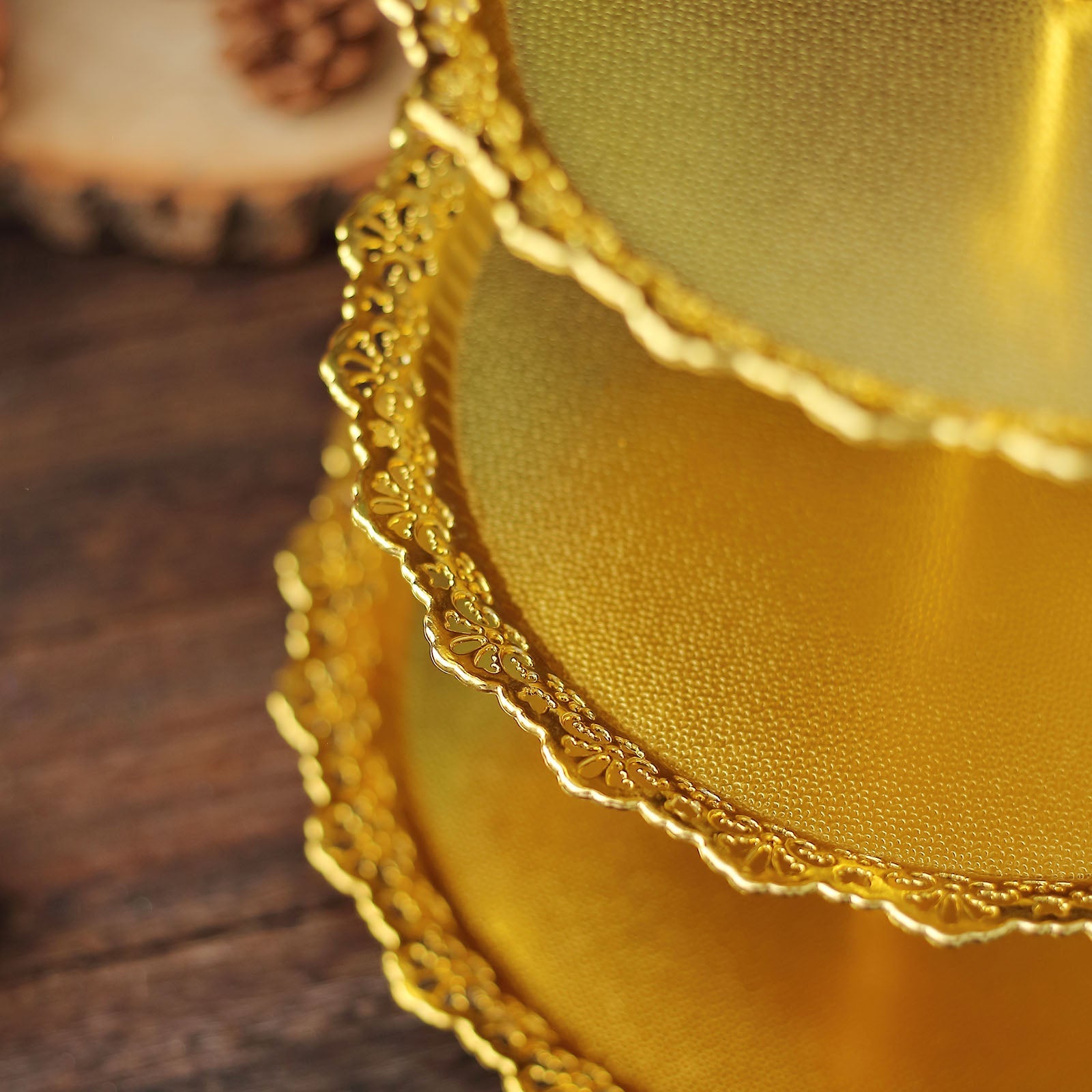 15" metallic gold 3-tier round cupcake display tray with lace cut edges.