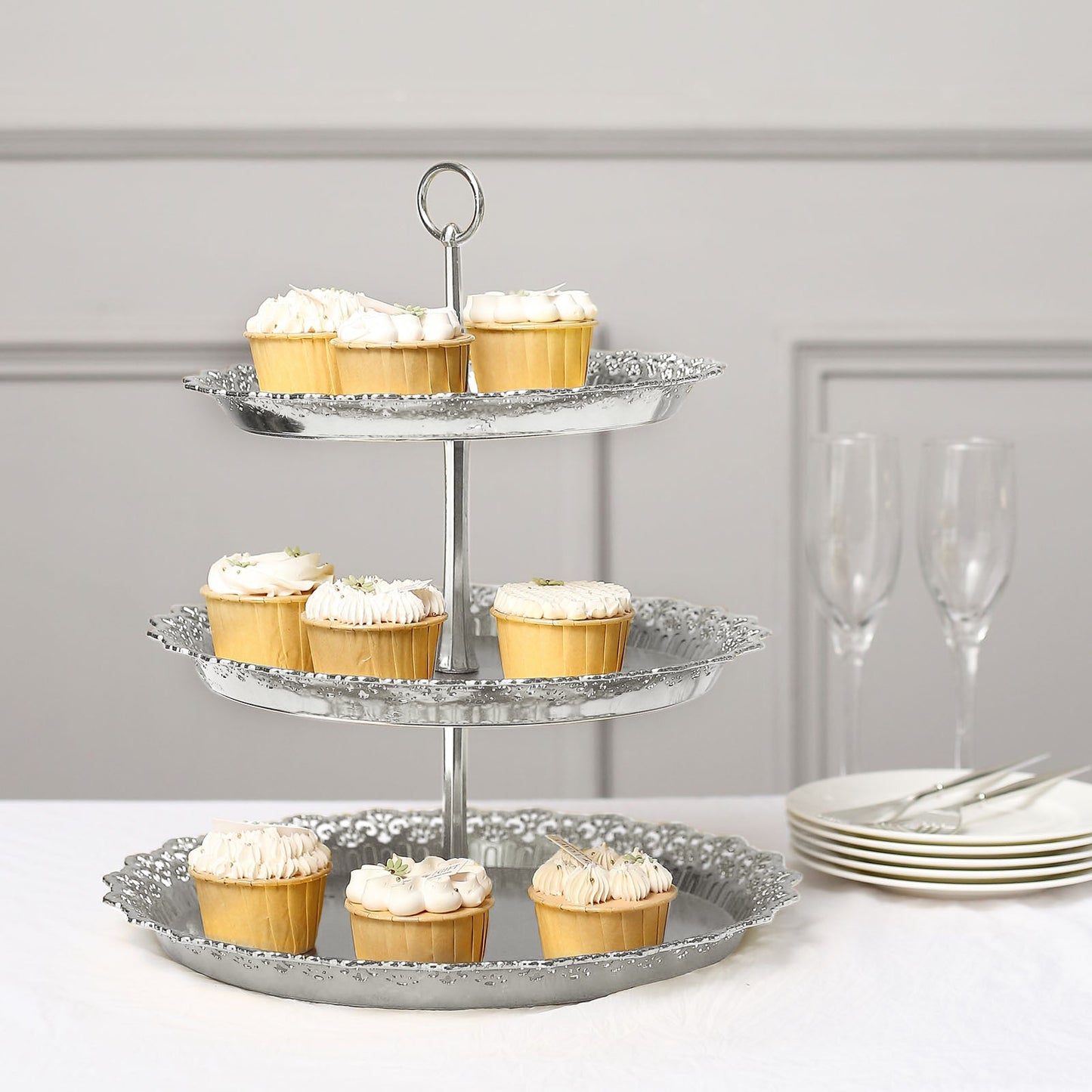 Metallic silver 3-tier round cupcake stand with lace cut edges.