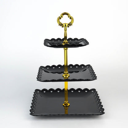 Black gold 3-tier cupcake stand with heart wavy edges and top handle.