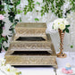 Gold embossed cake pedestal with ornate design, perfect for elegant displays.