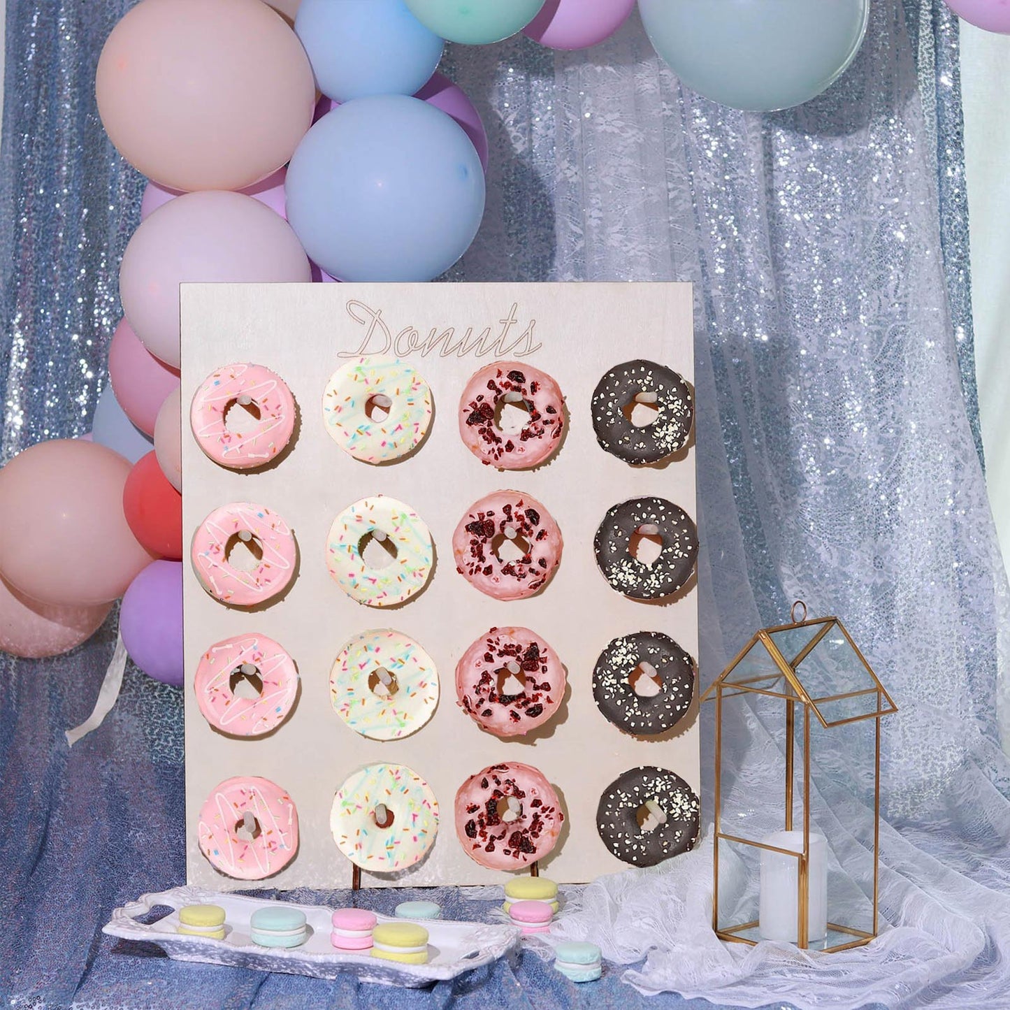 19" Donut Bar Wall Display Stand with pastel-colored donuts on a decorative board.