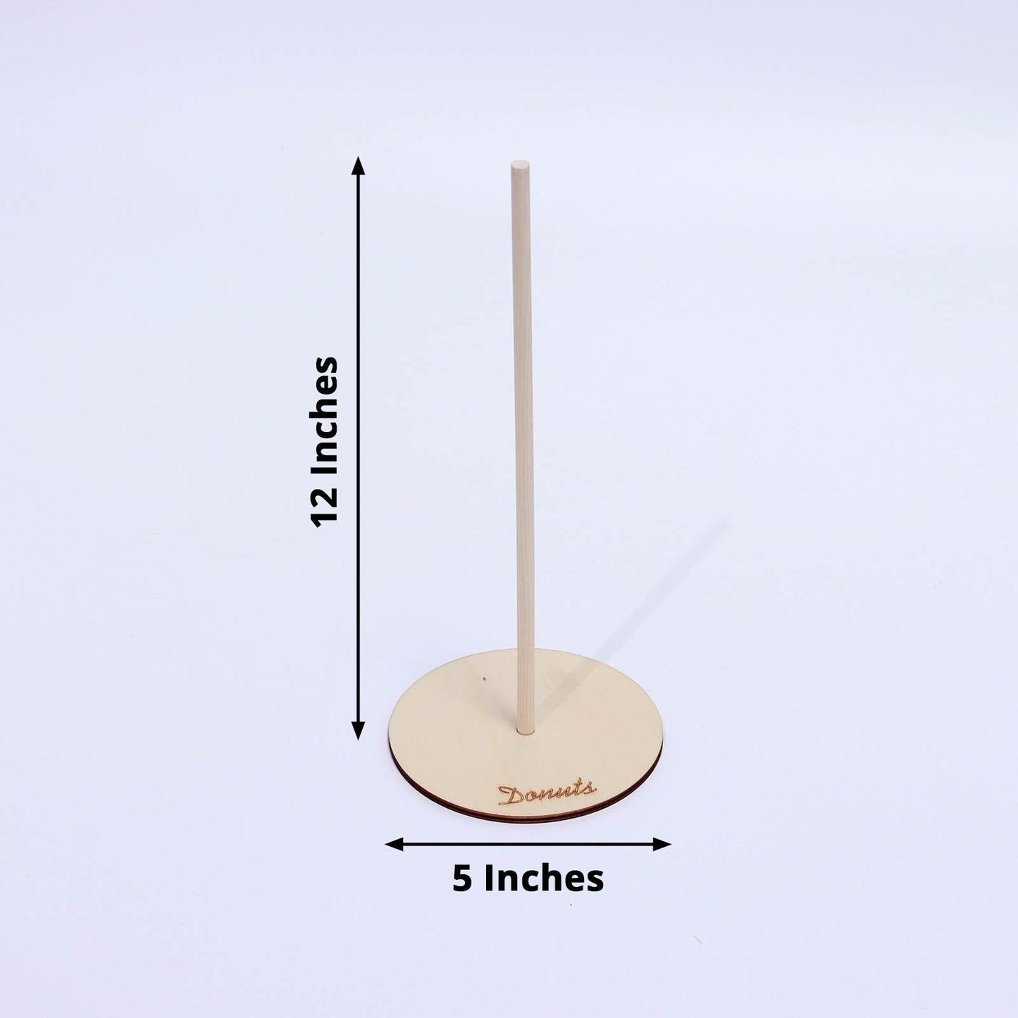 Beige donut bar display stand for weddings and parties.