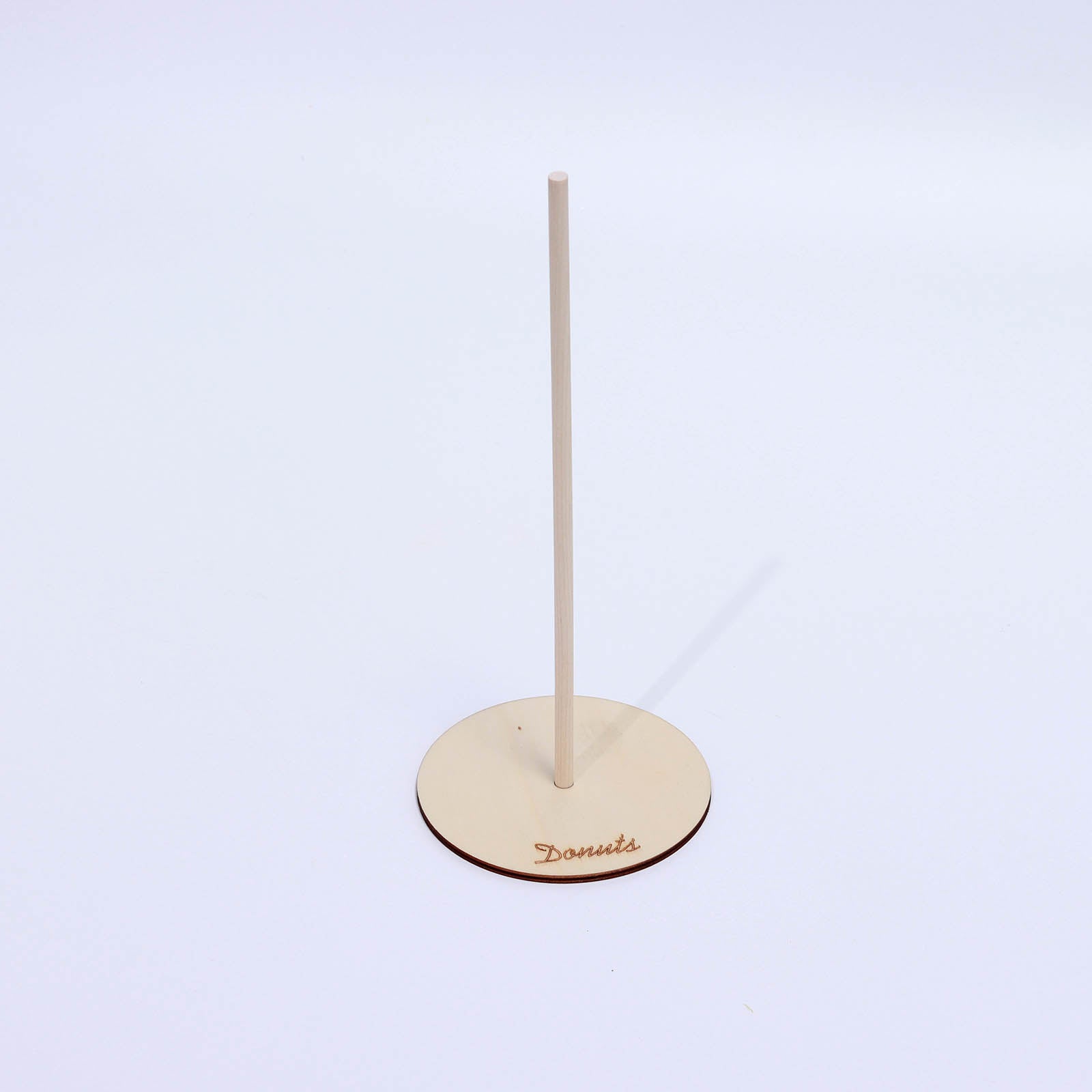 Beige donut bar display stand for dessert holding at events.