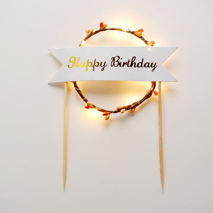 LED light up birthday cake topper with a glowing wreath design.