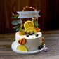 LED light up wreath birthday cake topper with yellow decorations.