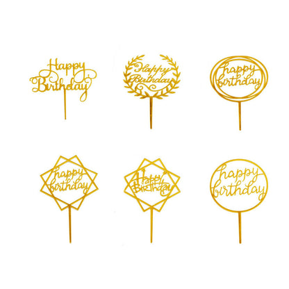 Gold acrylic birthday cake toppers in assorted styles, perfect for party decoration.
