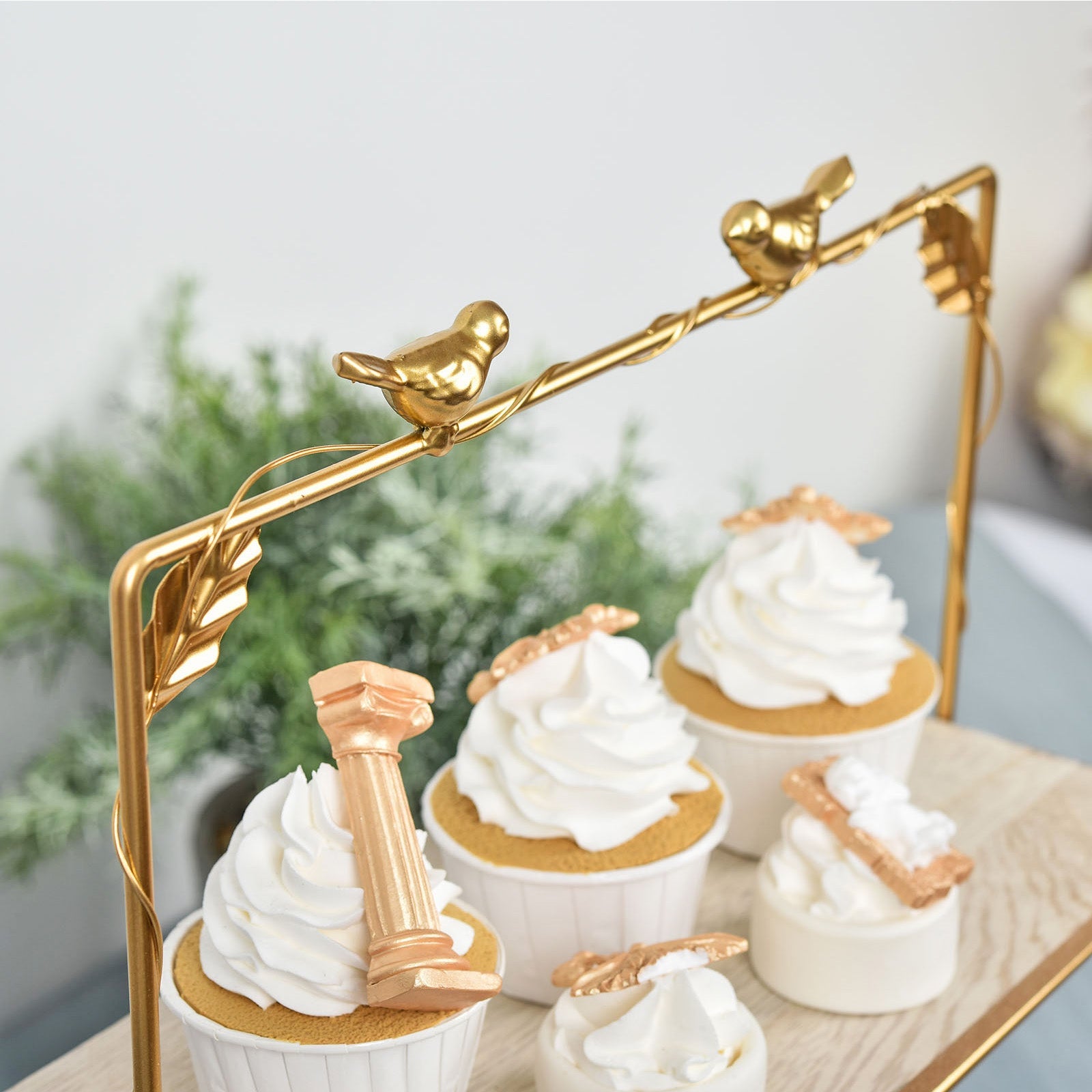 Gold 3-tier cheese board cupcake stand with rustic wood slice design.