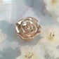 Rose gold mini rose floating candle for wedding vase fillers.