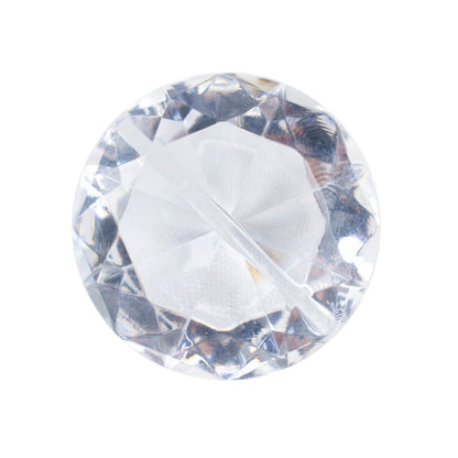 Clear plastic diamond-shaped place card holder stands for wedding table decorations.