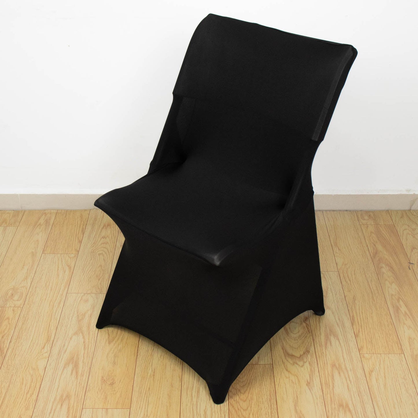 Black fitted spandex chair cover with foot pockets.