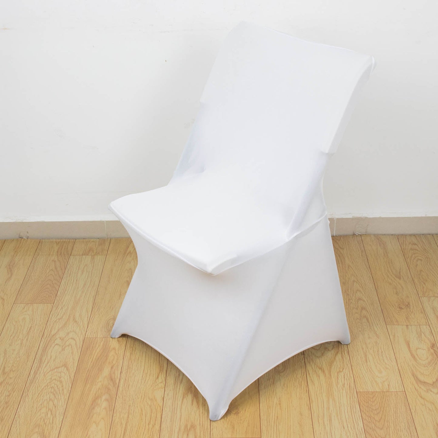 White fitted spandex folding chair cover with foot pockets.