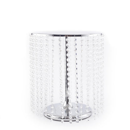 Metallic silver cake stand with crystal chains, 14" round and 16" tall.