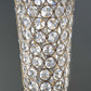 Metallic gold and crystal beaded hurricane floral vase centerpiece.