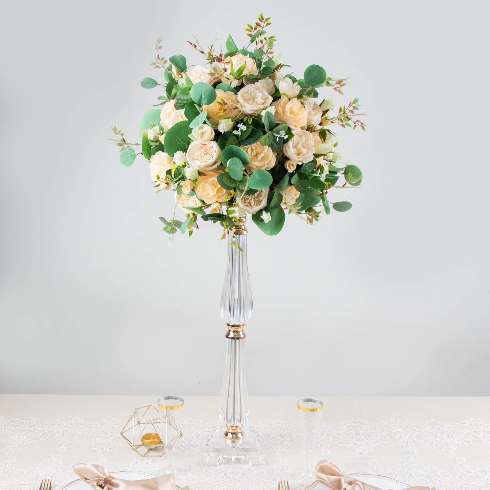 24" gold acrylic crystal candle stand centerpiece with floral arrangement.