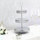 Silver 3-tier reversible cupcake stand for desserts and displays.