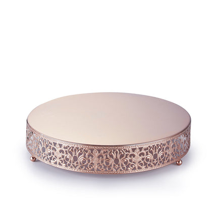 Rose gold metal wedding cake stand with Fleur De Lis design.