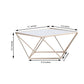 Gold geometric cake stand with square glass top, 14 inches in size.