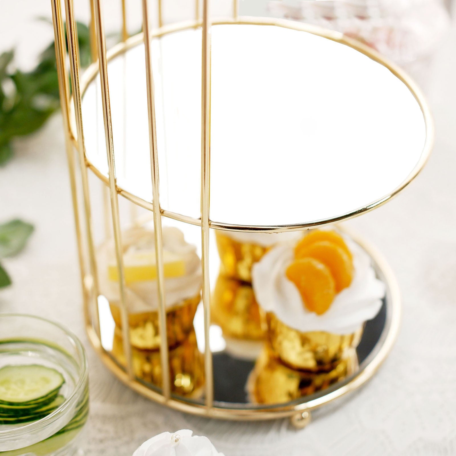 Gold 3-tier bird cage cupcake stand with a mirror base.