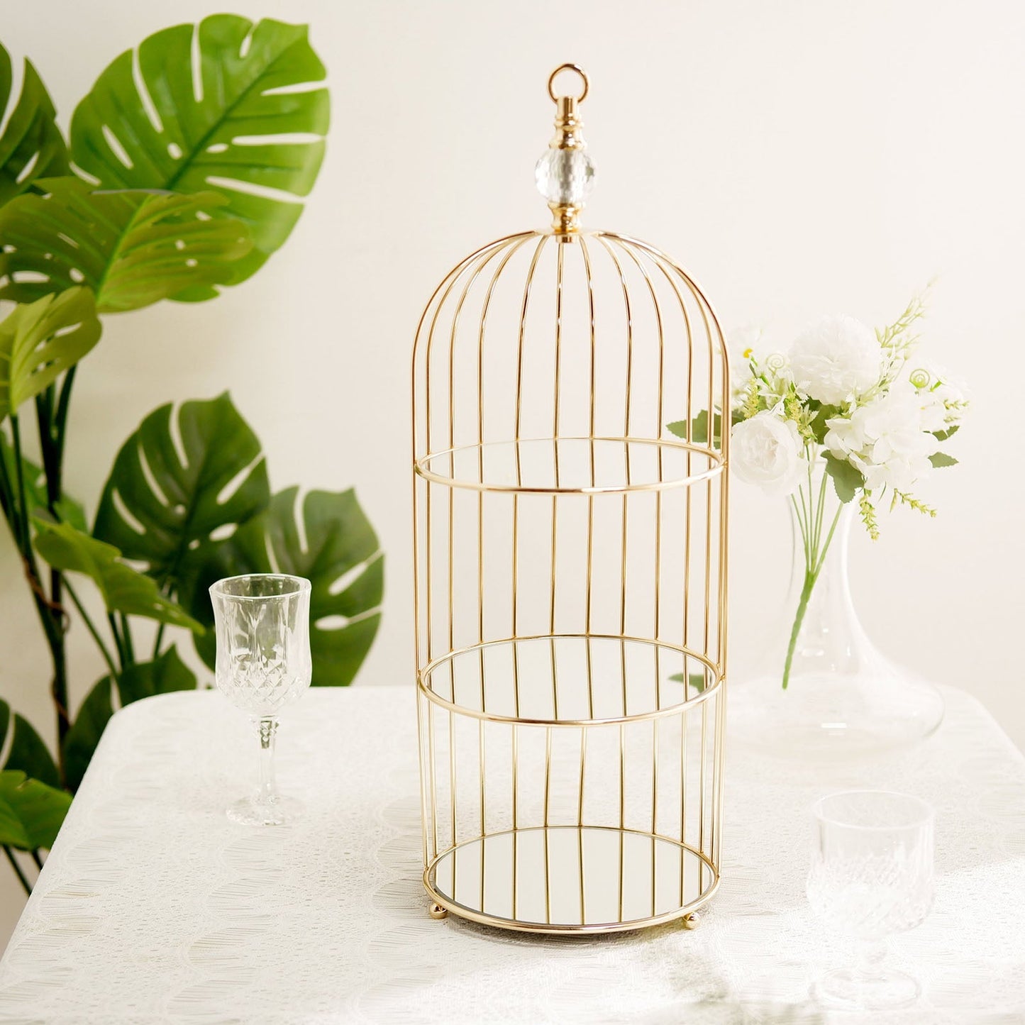 Gold 3-tier bird cage cupcake stand with mirror base and hanging option.