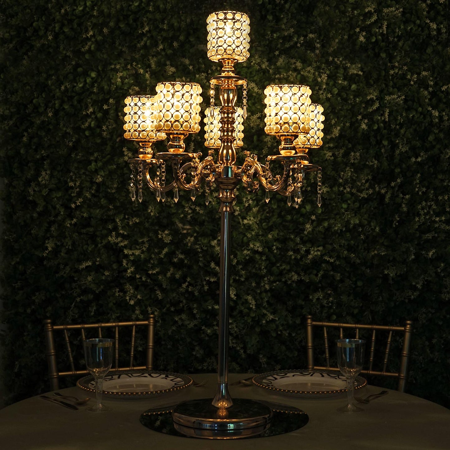 Gold pearl beaded 6-arm candelabra centerpiece with crystal pendants.