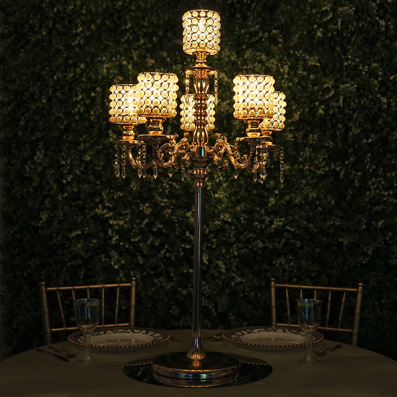 Gold pearl beaded 6-arm candelabra centerpiece with crystal pendants.