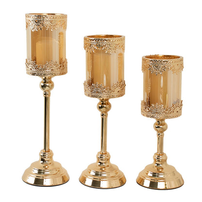 Antique gold lace design votive candle stands in three sizes.