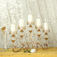 Antique gold 5-arm candelabra with hurricane glass votive holders.