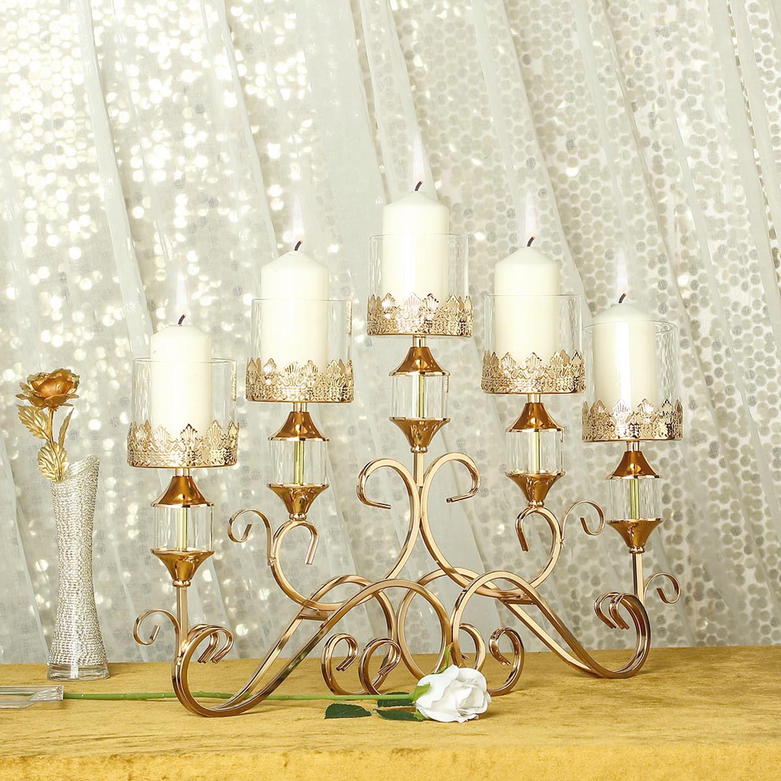 Antique gold 5-arm candelabra with hurricane glass votive holders.